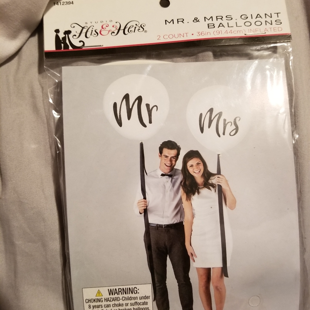 Mr. And Mrs. GIANT balloons.